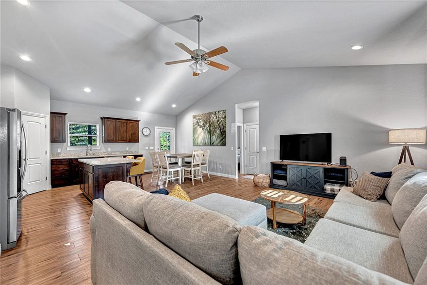 Welcome Home to 17 Hillington Circle. This like-new one story home offers 1,512 square feet of comfort, style, and community charm. Built in 2019, the home features three bedrooms and two baths. Inside, you’ll find bright open living spaces, with luxury vinyl plank flooring throughout- no carpet. Cathedral ceilings elevate the house with warmth and style. The kitchen is a standout with granite countertops, a spacious pantry, and a large center island with bar seating. The split-bedroom layout provides privacy for the primary suite, complete with a walk-in closet, while the secondary bedrooms are on the opposite side of the home. Enjoy the private deck overlooking a cleared and mostly flat .32-acre lot, the perfect spot for morning coffee or gatherings with friends. Living here also means access to Bella Vista’s best amenities—clubhouses, golf courses, fitness centers, trails, pools, playgrounds, and nearby Lake Windsor—all just minutes from your doorstep. This is the perfect place to call home in Bella Vista!
