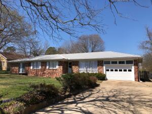 You really need to check out this spacious 4BR 3 BA brick home on large lot at the edge of town! Home features hardwood floors, large master BR and an office and great covered patio! Large lot with fenced backyard and 2 storage sheds. All #s approx. Age is an estimate.