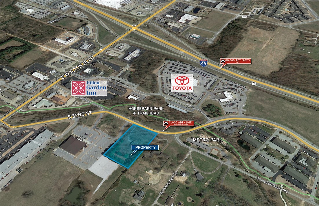 Opportunity to rezone +/- 1.85 acres of land to commercial for multi-family residential, office, or retail purposes. Property is surrounded by Metro Office Park and is less than a one-minute drive to SE Walton Blvd. with quick access to I-49 and Razorback Greenway.