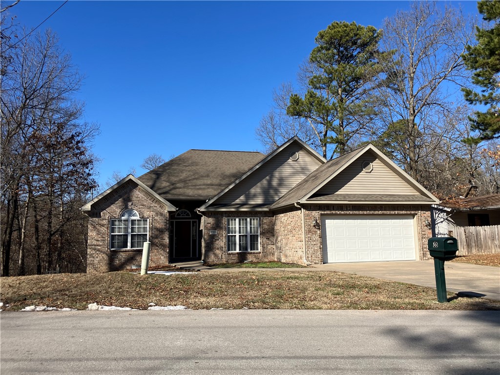 Come home to this light, bright home featuring a split floor plan with ceramic tile and plank flooring thru out. Large bedrooms all have ceiling fans and plentiful closet space, the covered deck looks out over the large fenced back yard and woods, and the living room fireplace is a cozy place to spend winter nights. The kitchen is an open design with large pantry and eating bar. Pets are welcome with owner approval additional and additional pet deposit.