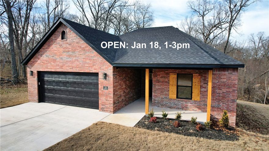 This inviting new construction Bella Vista home sits in a prime west-side recreation hub close to I-49 & offers a bright, modern feel families will love. Set on a quiet cul-de-sac minutes from Branchwood Rec—w/ its indoor pool, pickleball courts, & fitness center—& near Highland Golf & Pub, it’s ideal for active, outdoor-minded living. The open layout brings in natural light & features durable LVP flooring built for busy days. The kitchen includes granite countertops, SS appliances, walk-in pantry, & a cozy dining nook that makes everyday meals or weekend entertaining effortless. Curated lighting, convenient laundry room, & a recirculating water heater add comfort throughout. Step onto the covered deck to enjoy your private, tree-lined backyard on a large, level lot w/ room to play, relax, or garden. W/ move-in-ready ease, an awesome location, & quick access to bike trails, lakes, & amenities, this home suits many lifestyles. Use preferred lender Grand Savings $3500. A 2-year builder’s warranty adds peace of mind.