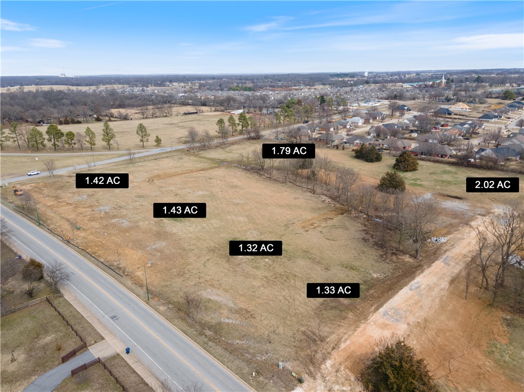 ASK ABOUT BUILD TO SUIT OPTION! BRAND NEW SUBDIVISION IN CITY LIMITS OF SILOAM SPRINGS ON LARGE LOTS! Park-like setting! Great location on North side of town! Close to John Brown University, Downtown Siloam Springs, Public Schools,Parks, and shopping etc! 11 lots for sale! See additional MLS listings for additional lots. This listing is for Lot 1, which is located at the corner of N Dogwood St and Villa View. 1.42 acres +/- Build your dream home here! Beautiful setting with easy access to everything you love! New parcel numbers to be assigned.