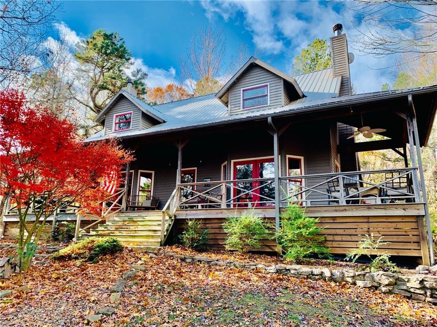 The Buffalo River Farmhouse is currently a successful nightly rental and furnishing and appliances are negotiable. With one of the premier locations in the area being only 2 miles to Kyle’s Landing on the Buffalo River, 2 1/2 miles from the mountain biking trails and rock climbing area of Horseshoe Canyon, this home is perfect for anyone seeking a place that is in the middle of all the Buffalo River Wilderness area has to offer. Just a 10 minute drive to Jasper to the East and a 15 minute drive to Ponca to the West. The home is located on over 5 acres & is set back in the woods overlooking a pond with large front and back porches. The 3 large bedrooms each feel like suites. The kitchen was renovated with hickory cabinets and walnut butcher blocks that add to the rustic charm. A new dual-fuel HVAC system was installed in 2022 and new LPV floors added in 2024. The front porch is wired for a hot tub but does not have one.