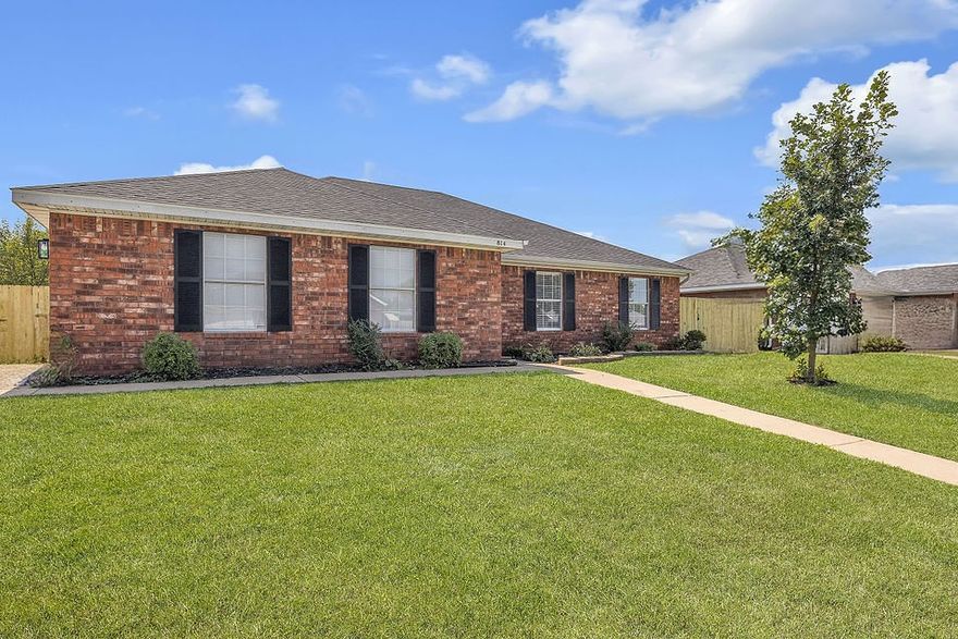 Discover this gorgeous, move-in-ready gem in the Meadowlands Subdivision! This home perfectly blends modern updates with a warm, community feel. The expansive open living area features vaulted ceilings, a cozy corner fireplace, and is wired for surround sound—making it the ultimate hub for gatherings. 
The entire home has been beautifully refreshed with popcorn ceiling removal, a new roof, fresh paint, updated flooring, and all new fixtures. A functional eat-in kitchen and separate laundry room keep daily life organized. Retreat to the spacious bedrooms, including a primary suite with elegant tray ceilings and a walk-in closet. Step outside to a fully fenced backyard with an open patio, ideal for play and relaxation. Located in the heart of Bentonville, you are just down the street from the new Walmart campus, top-tier dining, shopping, and parks. With easy access to I-49, this charming home offers the perfect central location. Come see it today!