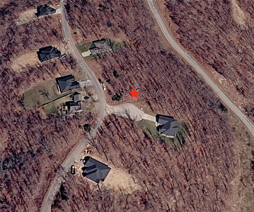 Very nice Bella Vista building lot ready for your dream home. South-facing, pie-shaped lot on a quiet cul-de-sac. Utilities at the street. On-site septic needed.