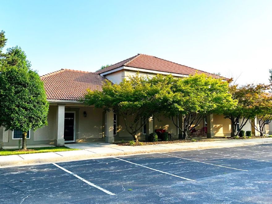 Village on the Creeks is the largest garden office park in Northwest Arkansas. It houses office, retail, restaurant, and medical tenants and enhances quality of life by offering a walking trail on Razorback Greenway and a lake with beautiful views. Suite 2 offers 8 lakeview offices, reception/conference room, kitchen area, two restrooms, and much more. 2 Levels with an exterior and interior staircase. 4 offices upstairs, 4 offices downstairs. large storage/copy room, 2 restrooms, large gathering room, large conference room upstairs with table.