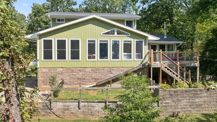 Lakeview! Close to Branchwood gym, pool, frisbee golf, & pickleball courts. 10 Min to Highlands golf course. 10 min to trail head for Tunnel Vision Mountain Biking. Stoneykirk boat ramp 1 min away. Very close to I-49 access. HVAC less than 1 year old. Septic recently pumped. 3 BR septic permit. Fire pit and shed. There’s plenty of storage under the home in the shop, and the fenced backyard includes a fire pit and shed. Large sunroom makes 2 living areas. 2 BR on main level & Office (potential 3rd BR) + bath on 2nd level & lots of natural lights!