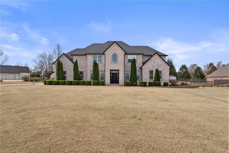 Looking for a home that's truly a hole-in-one? Well, I've tee'd up the perfect home for you! This nearly 5000 sqft estate sits on over 1 acre giving you plenty of room to host or simply unwind. The heated in-ground gunite pool is practically begging for a sunset swim (new pump 2025). With the golf course just beyond your backyard, your next round is just steps away! (golf cart path 2 houses down)

This home is quite the albatross showcasing 5 bedrooms, 5 full bathrooms, an office, formal dining, bonus room, flex spaces and the real Ace is not one, but TWO laundry rooms. With it's central location, it is less than 4 miles to the new Wal-Mart campus as well as to I-49 and just 6 miles to the Pinnacle Hills Promenade. Everything NWA has to offer is just moments away. 

This isn’t just a house, it’s a whole lifestyle. Don’t get stuck in the rough—let's tee up your private tour today!