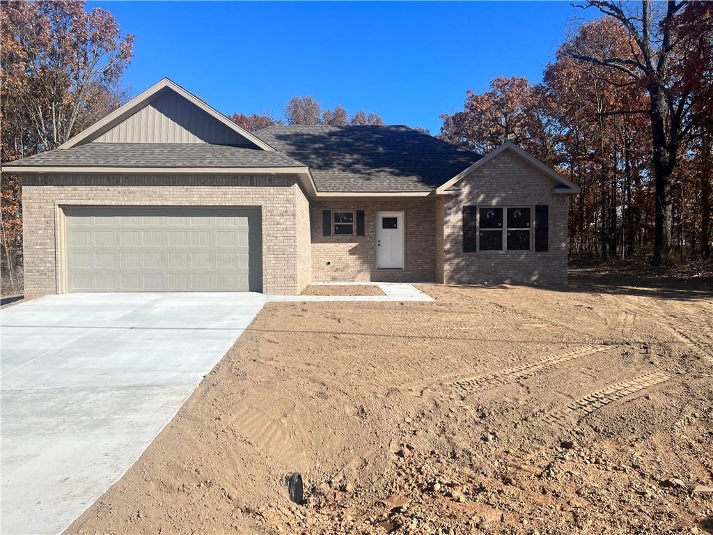 This open floor plan lives big for its square footage. Features include LVP flooring, Gas log Fireplace, solid surface countertops, Walk in closets in the Master, LED Can lights in all rooms, sold Prior to print.
Picture is of a similar home