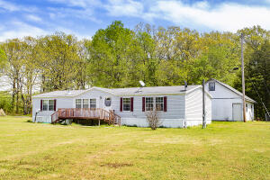 Spectacular home nestled in the countryside of Pottsville, AR. This home features 3 Bedrooms, 2 Baths, and a Bonus Room all within a 1,962 sq. ft floor plan. Outside enjoy the feeling of the country on this 4.4 +/- acre lot that is conveniently located just minutes from downtown Pottsville. Take advantage of the 672 Sq Ft. detached Garage or one of the many out buildings the property features. This is a must see listing and The only thing this home is missing is you! Easy to show, contact your agent today to schedule your personalized tour of this amazing home today.