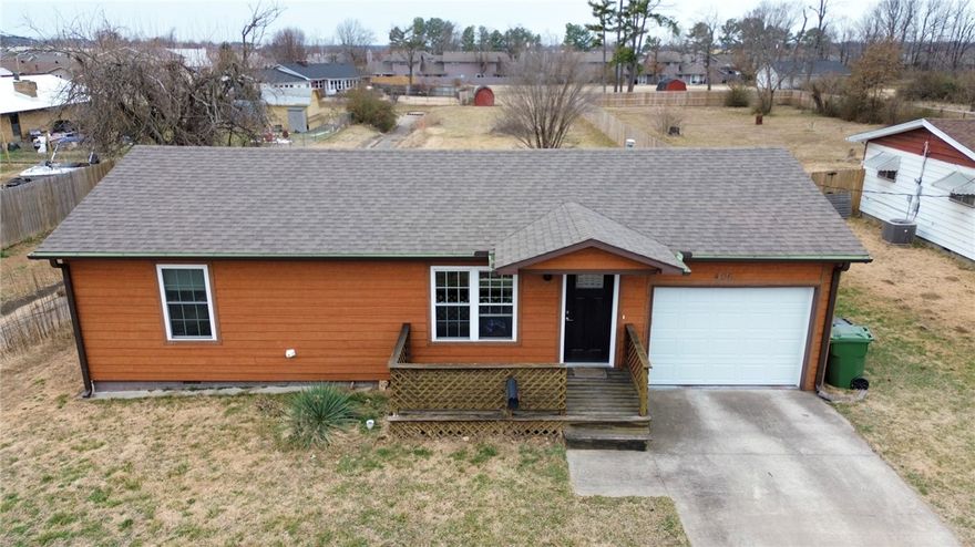 Well-maintained 2BR/2BA home on approximately 0.53 acres in a prime Rogers location. This property offers an efficient open-concept floor plan with a functional kitchen featuring granite countertops and ample cabinet space.

Positioned just 1.5 miles from Downtown Rogers, this property provides quick access to Lake Atlanta, Razorback Greenway trails, shopping, dining, medical facilities, and major employers including Walmart Home Office and Sam’s Club corporate campus.

Large lot offers flexibility for outdoor living, storage buildings, garden space, or future improvement potential (buyer to verify). Home is in good overall condition and presents a strong opportunity for buyers seeking an affordable, move-in-ready option with land — a combination that is increasingly difficult to find in Rogers.

Convenient access to major corridors while maintaining a residential neighborhood feel. Ideal for owner-occupants, first-time buyers, or investors seeking strong location fundamentals.