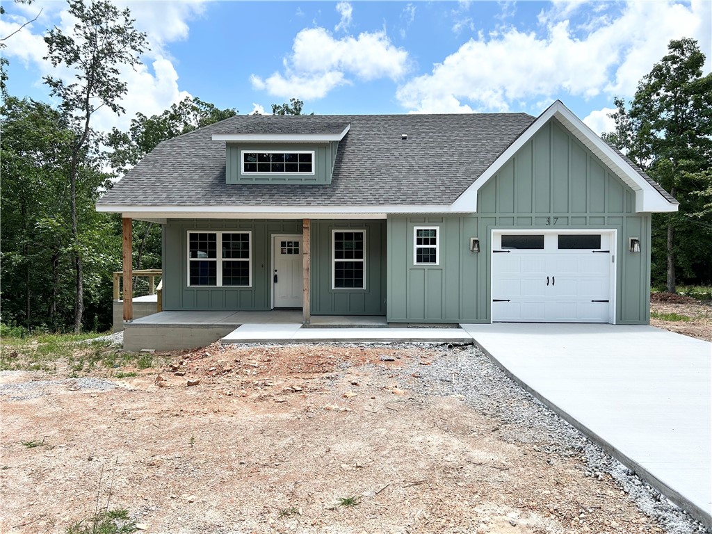 Discover this stunning new cons't craftsman style home located near the Loch Lomond boat launch and provides easy access to Highlands Golf Course, Branchwood trail, & 1-49. This exquisite home sits on a FLAT .34 acre wooded corner lot and boasts high-end finishes throughout! Step inside to find a stylish open-concept layout, adorned with wood floors. (no carpet) The focal point of the home is the kitchen, equipped with custom cabinets, a wood hood, luxurious countertops, & a large kitchen island. You'll love cooking with premium stainless steel appliances, including a gas range. Retreat to the primary bath, where you'll find a spacious walk-in tile shower & double vanity. 2 bedrooms / 2 baths. Plus, take advantage of $3,500 in buyers closing costs, courtesy of the builder's preferred lender! Approx completion date - 7/10/25. This home is eligible for RD financing (no down payment).