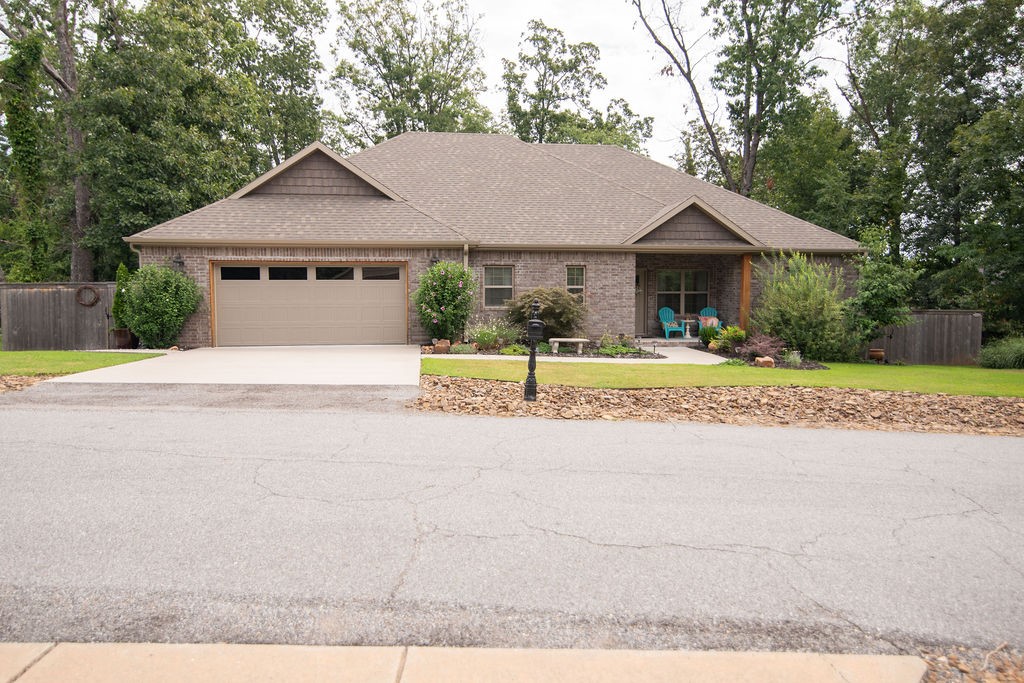 Better than New Home. Built three years ago and the owners have made this a magnificent home and yard. Beautiful landscaping throughout the entire property and added a fenced back yard. Move in and don't fuss over landscaping, fences and blinds; that is already done. The interior of the home is impeccable and has a beautiful view to watch the deer from the enclosed deck in the forest behind the home. The extra large garage has enclosed storage.