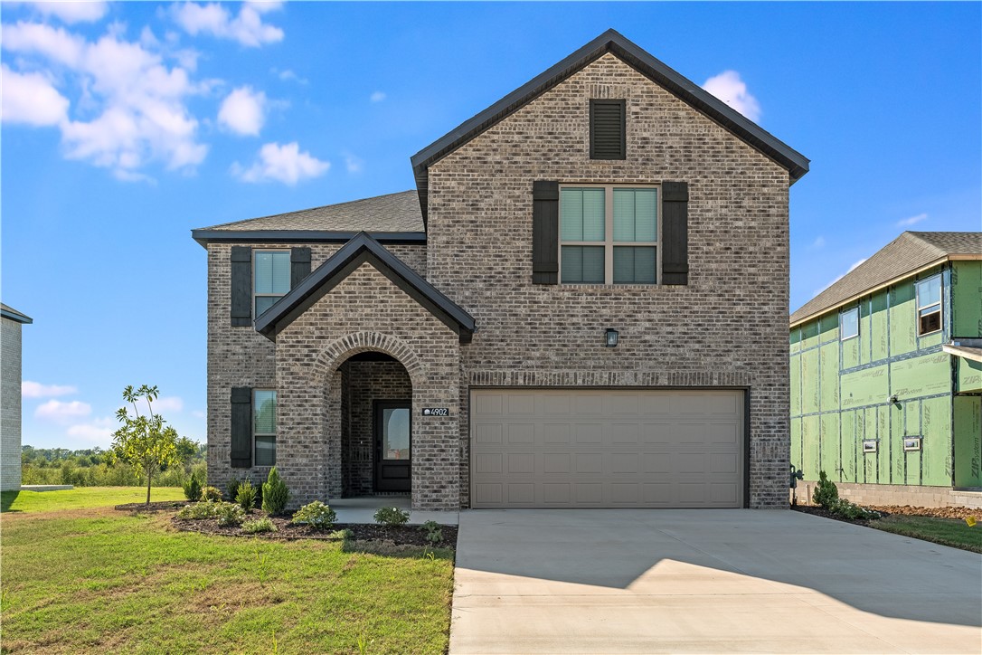 This beautifully designed rental home offers an open-concept layout filled with natural light, timeless brick exterior, and modern designer finishes throughout. The kitchen is equipped with upgraded features including sleek countertops, a gas range, and a stacked oven/microwave combo, perfect for everyday living or entertaining. Conveniently located less than 5 miles from XNA National Airport and just minutes from Bentonville and Centerton, this home also provides easy access to Walmartās new Home Office campus, shopping, dining, and entertainment. Fence will be installed prior to move in.