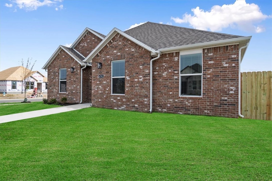 1813 Plan with 1813 Square feet in The Element Phase 3! Experience all that Fayetteville has to offer while living in a brand-new home in The Element which is just off of Broyles Road in Fayetteville. These homes will be 4-sided brick (per plan). Architectural shingles! Lovely kitchen with quartz countertops and backsplash! 42-inch cabinets! Master bathroom will have a fabulous en-suite with oversized walk-in shower! Gas Fireplace with Brick Surrounds to ceiling! Flooring will be LVP and Carpet. Craftsman style front door with glass insert. Rear Load Garages.