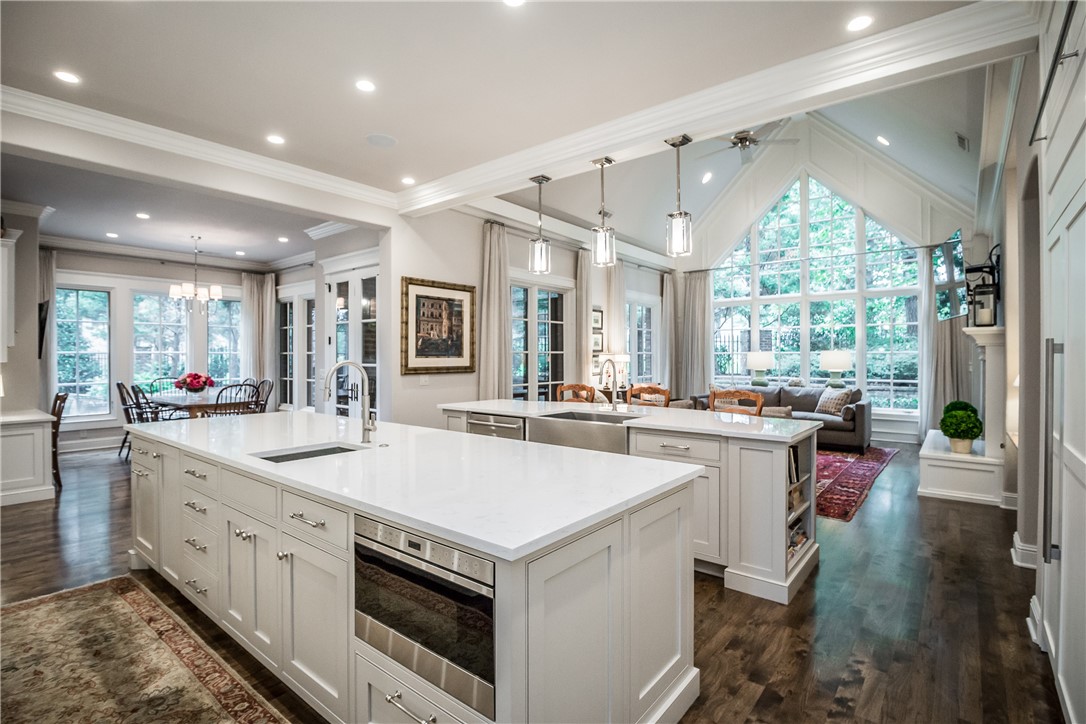A true work of Art, this stunning Clear Creek home was fully renovated in 2016 with the utmost appreciation for detail and design. Meticulously planned, quality craftsmanship & designer finishes provide the finest living in mind. Beautiful open floor plan w/vaulted great room offering an abundance of natural light shining through the homes many windows. Well appointed gourmet kitchen features an eat-in breakfast area, 2 islands, professional appliances, butler's & walk in pantry. The master suite is privately positioned w/beautiful English courtyard views & luxurious master bath w/adjoined walk-in closets. Upstairs boasts 3 guest bedrooms, library & spacious recreation room w/a kitchenette & half bath. The screened porch, along with the English-style courtyard provide additional living space ideal for entertaining or simply relaxing outside by the outdoor stone fireplace & grilling area. Situated on a desirable quiet cul-de-sac w/side entry 3 car garage, separate golf cart garage & a welcoming covered front porch.