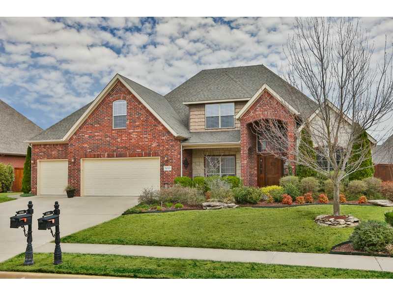 This Lochmoor beauty backs up to neighborhood green space, providing privacy and a great view of neighborhood amenities. Home is extensively landscaped all around, with a sprinkler system, covered/extended back patio and large covered front porch, plus a,true four car garage! Rare find! Inside, enjoy hardwood floors and solid doors throughout! More features include security system, granite tops, central vac, cased windows, and a jetted tub in the master bath. The perfect Lochmoor home!