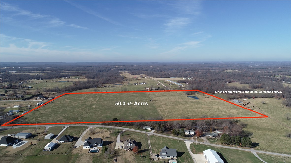 Unleash your investment vision with this extraordinary 50.0 +-acre parcel of pristine, level land located just moments away from the thriving town of Tontitown, Arkansas. Positioned strategically 2 miles south of Highway 412 on Harmon road, this remarkable property boasts a prime location that promises exceptional accessibility and convenience. With growth and expansion moving west from Tontitown, the canvas for a subdivision is wide open for the right investors. This property has so many attractive options to explore. Call today for a tour. More Acres are available. See MLS listing #'s 1262027, 1262319 for additional parcel information.