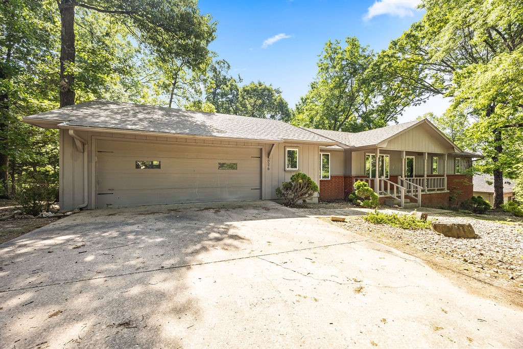 Only 5 minutes from the Prairie Creek Marina. This 1,827 sq./ft. 3-bedroom, 2.5 bath home is very spacious, and comes with a new roof as of April 2025. It has a dedicated office with built-ins and new laminated wood flooring. A formal dining room, plus a large eat-in kitchen with a built-in buffet area. The heated and cooled basement workshop is perfect for a man cave, she-shed, craft room, or whatever your heart desires. You will find this lovely home has newer wood laminate flooring and paint throughout. The home's HVAC system was upgraded to a Trane, which is only a few years old. Home also has an attic fan to help cool the house down when the windows are open. You are going to love the oversized deck that has been freshly painted. It's large enough to entertain while overlooking the private backyard and partially wooded views. And all of this is nestled on 0.65 acres. This is a must-see home. Whether it's your permanent residence or a holiday getaway retreat. Don't let it slip away before you can view!