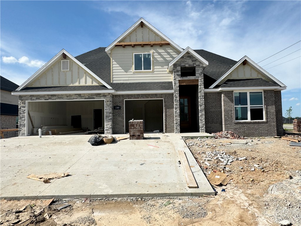 Concessions Include: $7500 from the Builder towards closing costs or lowering your interest rate. Get an additional up to 5k if you use the preferred Lender not to mention get the fence, blinds and gutters included. Welcome Home to Diamond Estates! Join us every Sunday 1-4 to learn about this amazing community with Clubhouse, Pool and within walking distance to Bentonville West High School.The Sullivan Plan has four bedrooms, three full bathrooms, a powder room and an upstairs game room. The two story living room with abundant natural light is a showstopper. Granite countertops, designer lighting, soft close cabinets, wood floors, stained beams and shiplap accents make this one a must see!
