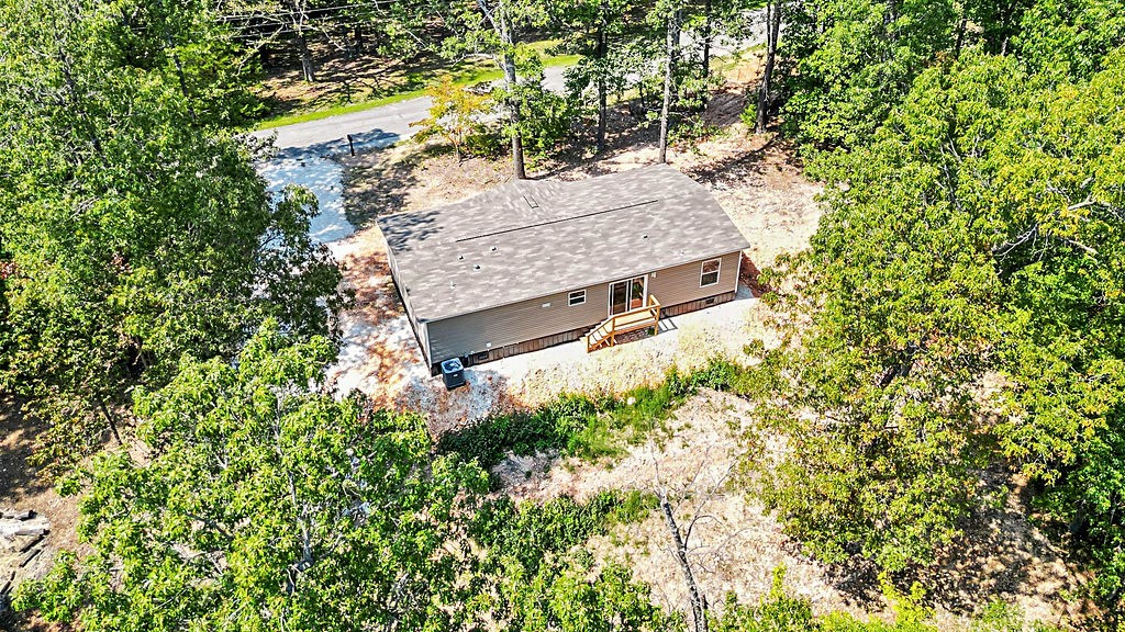 Charming 3-bedroom manufactured home with 2 full baths on 1.27 Acres nestled on a peaceful lot in Weddington Woods. This brand new home offers the perfect blend of comfort and functionality. The open and inviting floor plan provides ample living space, while large windows fill the home with natural light. Enjoy the privacy and space of country living while still being conveniently located near local amenities and schools. With plenty of room to expand and endless possibilities, this property is a rare find in the growing Fayetteville area. It is less than 10 minutes from i-49. Donāt miss this opportunityāschedule a showing today!