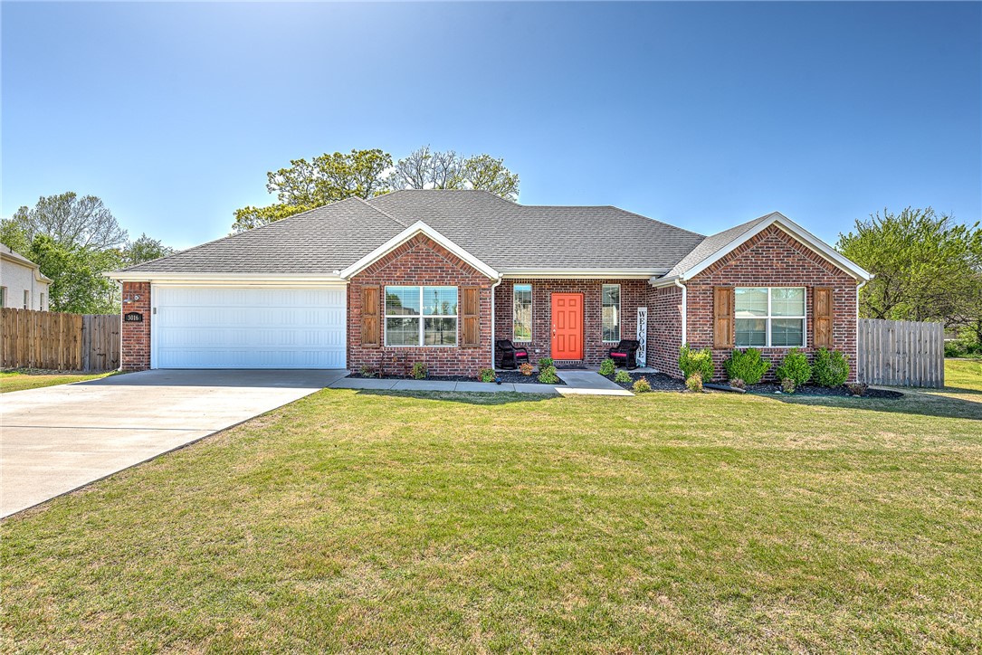 Welcome to your like-new home in Elm Springs! Built in 2020, this charming all-brick home has a modern, clean feel, and a thoughtful open floor plan. Step inside to discover hardwood floors in the spacious living room, complete with fireplace, perfect for entertaining or nights in. The open floor plan flows seamlessly, with all your main areas connected. Cathedral ceilings with wooden beams adorn the primary suite, offering a touch of craftsmanship. With 3 bedrooms and 2 full baths, there's ample space for family and guests. The large back yard has beautiful views, and the house sits away from neighbors on three sides. Large 8x12 shed conveys! Situated within walking distance to Shaw Park, enjoy easy access to outdoor recreation. Plus, its central location in Northwest Arkansas, just minutes from I-49, ensures convenience to amenities and attractions. Don't miss the opportunity to call this gem home!