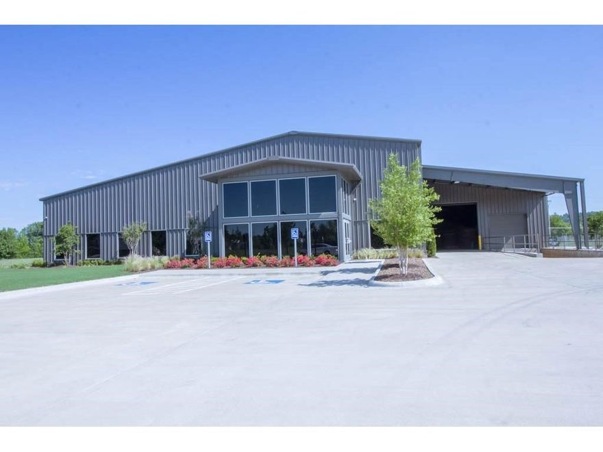 NEW!!! By far the nicest CLEAR SPAN manufacturing building in Northwest Arkansas. This facility features 5 beautiful offices, a magnificent conference room, gorgeous lobby all with lovely wood grain ceramic tile floors. It is outfitted with state of the art sound system, fire alarm and sprinkler system. Upstairs...there is plenty of room to expand offices or use for storage. Dock has two doors. One drive in and one loading dock door. THE NICEST MANUFACTURING BUILDING IN NWA...A MUST SEE.