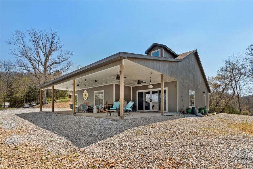 A rare find on Beaver Lake in this almost new lakeview home on 27 acres with a private dock!  Immaculate 3 bedroom, 2 bath home with beautiful views, space to spread out and a one (24') slip private dock down the hill. There are a few additional potential home sites or you can enjoy the privacy of the acreage.  Roads are paved all the way to the driveway.