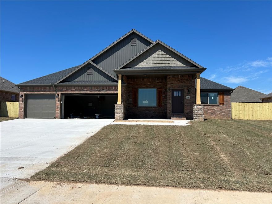 Stunning new construction—this single-story home features 3 bedrooms, 2 bathrooms, and a spacious 3 car garage. The kitchen is equipped with stainless steel appliances, a gas cooktop, microwave, vent hood, pantry, and granite countertops. A large fireplace flanked with built-in bookshelves serves as a striking centerpiece in the living room. Elegant details include wood-cased windows with 2-inch blinds throughout. Enjoy great curb appeal with a large front porch, fully sodded oversized yard, and privacy fence. The covered back porch and fully installed gutters add both comfort and functionality. The primary suite boasts an oversized tiled shower and a walk-in closet that connects directly to the laundry room, located near the garage for added convenience. Durable brick exterior construction ensures longevity and low maintenance. Seller will pay $2,500 in buyer concessions. $5,000 lender credit available with preferred lender. Interior photos are of similar plan, interior finishes may vary.