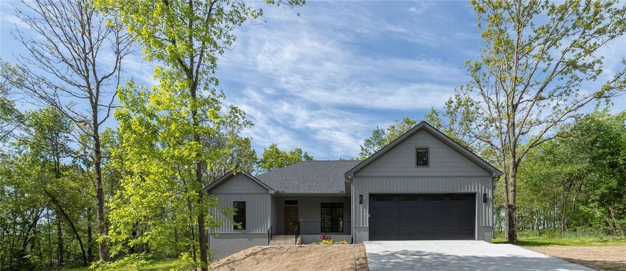 Live where the trail begins and get up to $3K in builder paid closing costs with acceptable offer! This beautiful 3 bed/2 bath, 1569 sf new construction home sits in a quiet cul-de-sac, just 1–2 miles from Loch Lomond, Highlands Golf & Branchwood. From the front porch, enter inside to a warm wood entry that features a bright open-concept great room w a gas fireplace & access to the covered patio. The kitchen features quartz countertops, LG stainless steel appliances, walk-in pantry & dining area with tree-lined views. Enjoy LVP flooring, curated lighting & luxury finishes. The primary suite offers a peaceful retreat with a walk-in closet & ensuite bath and direct access to the laundry room. Standout extras you won’t find in every new build: 8" baseboards, tall windows, drop zone, 4'x11' garage storage room & attic space, gutters, tankless water heater, spray foam interior walls (noise reduction & pest resistance), three bedroom septic & 500 gal propane tank. It's move in ready - just waiting for you!