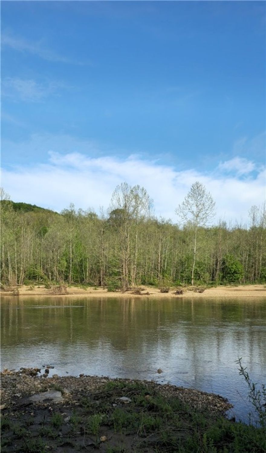 Come check out this surveyed, 81.47 acre tract, with no restrictions, located off Dubuque Road in Boone County, AR!  The land is gently rolling with open pasture and hardwoods, and best of all, it has access on both sides of Bear Creek! There's a generator-operated well, access to electric, and several potential build sites. Two Spring fed creeks with stair step waterfall and bluff overhangs and "Grotto" hide out. Tons of history in this area with stunning views and a serene environment await—a peaceful retreat from the daily grind! Don't miss this opportunity to own your piece of paradise, perfect for hiking, camping, and enjoying nature.