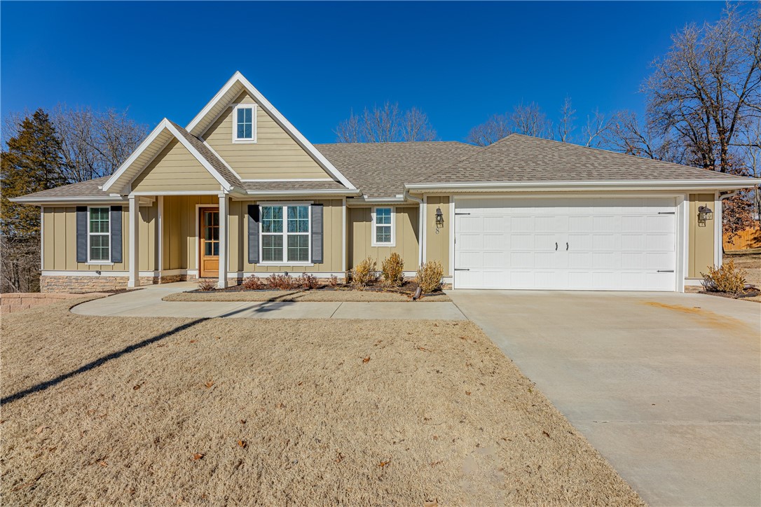 Welcome to your dream home nestled at the end of a charming cul-de-sac! This meticulously cared-for 4-bedroom, 2-bathroom residence is the epitome of comfort and convenience. As you step inside, you'll be greeted by a thoughtfully designed split floor plan that maximizes both privacy and functionality. The heart of the home is the kitchen, boasting an extra-large walk-in pantry, making meal preparation a breeze. The master suite is a true retreat, featuring a double vanity, a walk-in shower, and a soaker tub. Step outside to your private backyard oasis, where entertaining is a delight. The covered deck with paver stones offers an ideal space for gatherings, while the separate basketball court adds an element of fun for all ages. Easy access to the more than 100 miles of mountain biking and hiking trails in Bella Vista, making it a haven for outdoor enthusiasts. Embrace the convenience of a home that has been lovingly maintained. Don't miss the opportunity to make this your home sweet home!