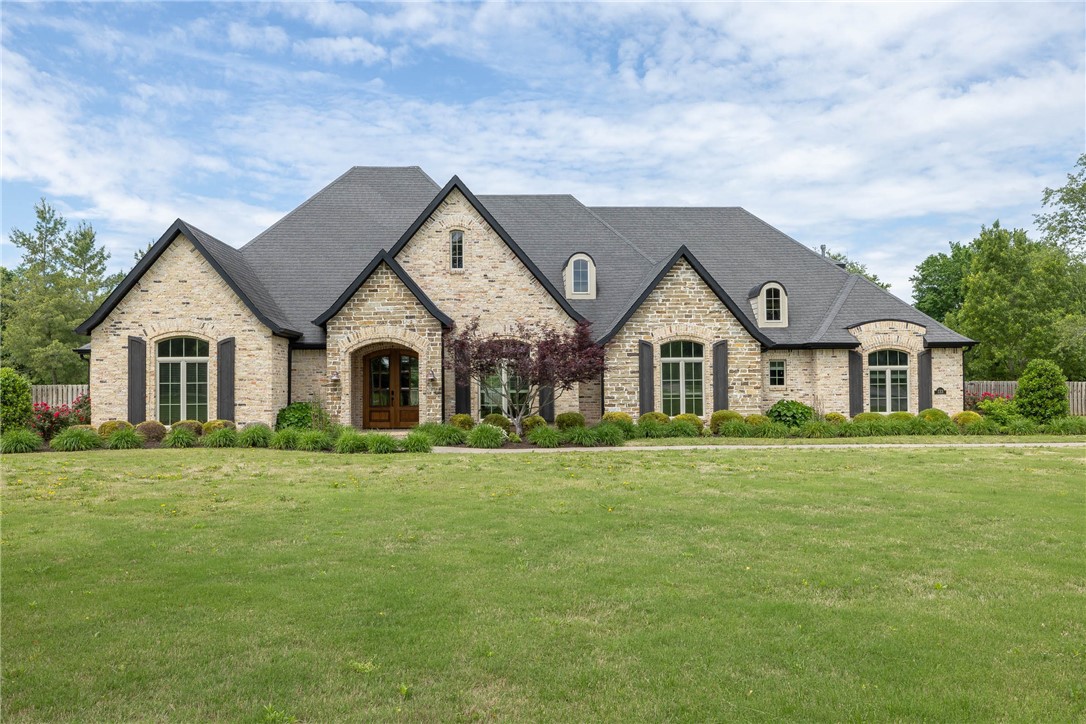 Stunning 5BR/4Ba home on 2 Acres with Pool and Elegant finishes. Welcome to your dream retreat! Nestled on 2 beautifully landscaped acres, this home offers the perfect blend of luxury, space, and comfort. Step inside to find handscraped real wood floors and soaring cathedral ceilings that create a bright, open ambience throughout the main living areas. This kitchen features granite countertops, stainless steel appliances and has an eat in kitchen. The spacious living room, anchored by a cozy fireplace, which flows into the dining room and out onto the back patio. Enjoy the convenience of a main-level primary suite with a spa-like ensuite bath, along with 2 walkin closets with additional bedrooms that offer flexibility for guests, a home office, or multi-generational living. Outside, you'll find a peaceful setting surrounded by wide open space around the beautiful pool that creates a space for enjoyment and entertainment. Don't miss this rare opportunity to own a spacious, move-in ready home with acreage.