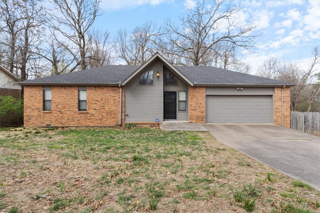 Located in the heart of Springdale, this charming 3-bedroom, 2.5-bathroom home offers comfort and style in an established neighborhood. The spacious downstairs bedrooms and additional living area provide flexibility for relaxation or entertainment. The perfect split floor plan layout ensures ample space for everyone. The open kitchen and living room create a seamless flow, ideal for family gatherings and hosting guests. Imagine relaxing in the cozy living room with wood burning fireplace, perfect for creating a warm and inviting atmosphere. The primary bedroom features an en-suite bathroom with a walk-in shower and closet. Enjoy the spacious backyard with a covered deck, ideal for outdoor activities. Recently upgraded with a brand new roof installed March 2025, this home is ready for buyers to make it their own in a vibrant community with a rich history and modern amenities.