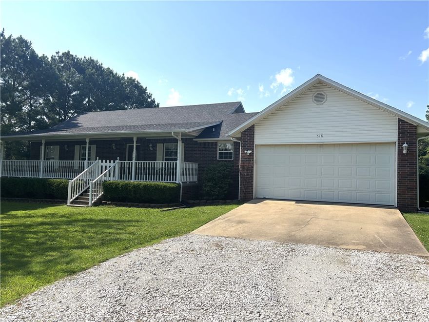 For privacy and space in the middle of town, come see this 1,486 SF, 3 BR, 2 BA brick home sitting on 2.46 acres at the end of a cul-de-sac street. The home is in fantastic condition, has a 2-car garage, an open two acre level yard behind the house with 5 raised flower or vegetable garden planters, an 8x10 storage building, large covered front porch, covered back porch with a nice 4x8 inground storm shelter, a wood stove in the living room, and a marvelous kitchen and dining area. New roof in 2019 and new HVAC in 2022. PLUS - the refrigerator conveys to buyer! VERY NICE!