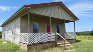 Cute two bedroom one bath home in the country with 5 acres and mountain pasture views surrounding. Private yet not far from town make this country home yours today!