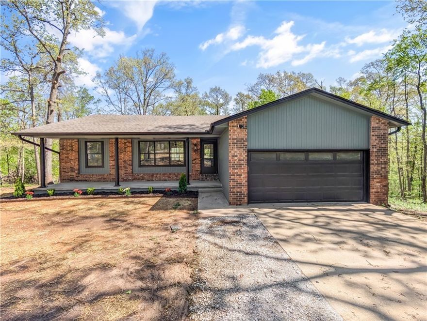 Welcome To Your Next Home! This Fully Remodeled Gravette Beauty Sits On Nearly 1.5 Acres Of Peaceful Land And Brings A Fresh New Feel From Top To Bottom—Loaded With Updates That Make It Move-In Ready And Then Some! The Main Level Has A Wide Open Living Area That Flows Right Into The Kitchen And Oversized Dining Space, So You’ll Have Room To Spread Out Or Bring Everyone Together For A Meal. The Primary Suite Includes A Walk-In Closet And A Dual Vanity And Sharp Custom Tile Shower That Adds A Bit Of Wow To Your Morning Routine In The Primary Bath. Plus There Are Two More Bedrooms, A Full Hall Bath, And Laundry Right Where You Want It On The Main Level. Downstairs You’ll Find Another Big Living Area With A Fireplace, An Extra-Large Bedroom With Its Own Full Bath, And Easy Access To The Backyard From Both Levels For Hanging Out, Letting Pets Roam, Or Just Enjoying The Nature. Come See!