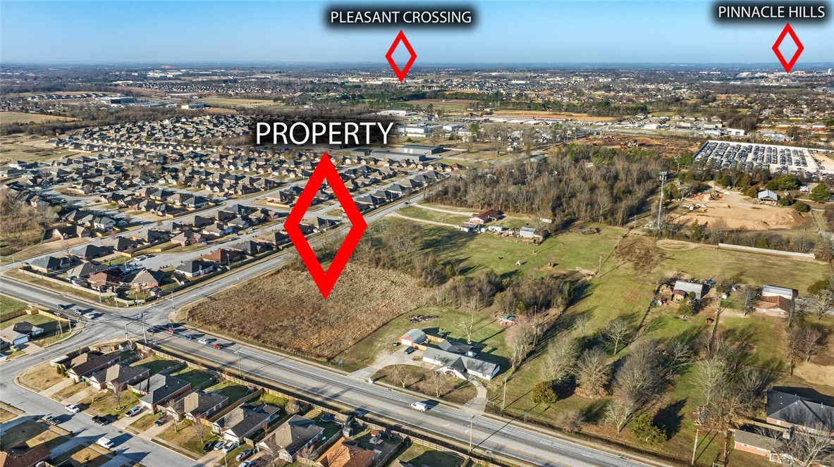 An incredible investment opportunity near the vibrant heart of Downtown Rogers! This prime 2.32 -acre commercial lot is perfectly positioned amidst thriving neighborhoods, flourishing businesses, and top-rated schools, making it an ideal location for your next venture. Imagine the possibilitiesāwhether it's a high-traffic convenience store, a modern strip mall, or a dynamic mixed-use development catering to the growing community. With T 5.1 zoning already in place, the groundwork is set for success. Architect and engineering plans are available for purchase, streamlining your path from vision to reality. Don't miss the chance to bring your business dreams to life in this rapidly expanding area!