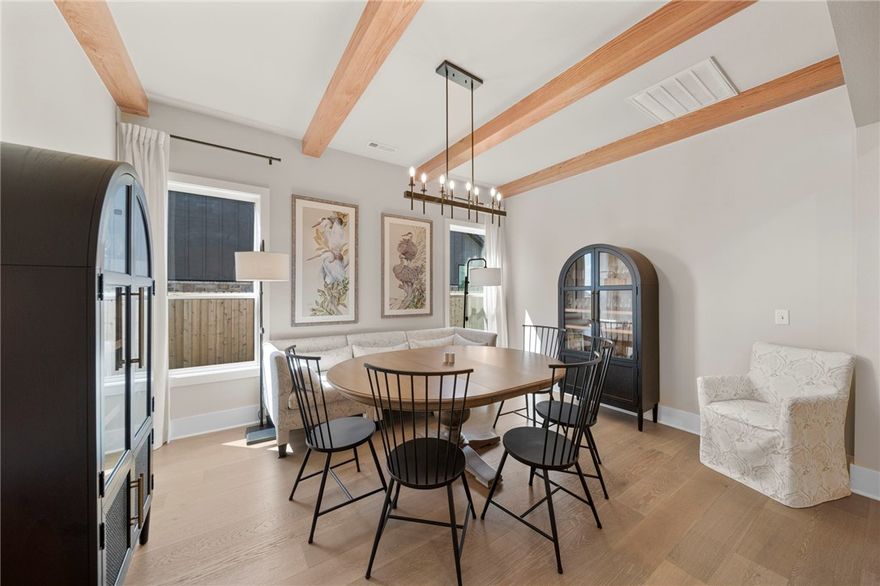 Welcome home to Starry Night! This 2024-built home has thoughtfully prepared and truly move-in ready in the prestigious Evening Star community. Positioned directly across from the neighborhood’s premier amenities, including a resort-style pool and playground, and with no homes across the street, this residence offers location, luxury, and the kind of work/life balance you've been reaming of. Inside, an open-concept layout showcases 5 spacious bedrooms, 4 bathrooms, a formal dining room, and a large flexible bonus space. The gourmet kitchen features double ovens, a gas range, and ceiling-height cabinetry perfectly suited for everyday living and entertaining alike. Quality and care are evident throughout, with wood flooring across the main level, custom built-ins, extended attic storage, and a generously expanded back patio ideal for relaxed outdoor living. Every system, finish, and detail has been professionally inspected and addressed, allowing the next owner to move in with complete confidence.