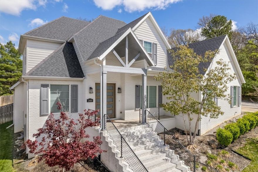 Indulge in luxury living in desirable East Fayetteville with this stunning 4 bedroom, 3.5 bath home spanning 3,514 sq ft. An entertainer's dream, its open layout seamlessly connects the kitchen, living, and formal dining areas, complemented by a study/office. Upstairs, find an entertainment room with a wet bar. The kitchen boasts a large island, double ovens, gas cooktop, and wet/coffee bar. Retreat to the master suite with a beamed ceiling, main shower, vessel tub, and oversized closet. Enjoy the convenience of a 3-car garage and unwind on the covered patio. Modern amenities include central vac, security system, pre-wired surround sound, and blinds. Experience upscale living at its finest in this meticulously designed home.