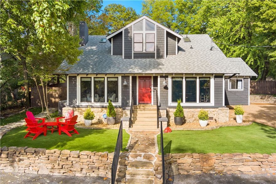 This fully renovated 1908 historic home is a proven, turn-key short-term rental property situated on a 0.31-acre lot just two blocks from Donald W. Reynolds Razorback Stadium and the University of Arkansas campus.

The 2,450 sq ft home features 4 bedrooms, 2.5 bathrooms, and charming vintage details paired with modern updates. Inside, you will enjoy a cozy gas fireplace, large living area, updated kitchen, and curated Razorback-themed decor for a fun atmosphere perfect for family and gatherings.

Another standout feature is the expansive backyard entertainment area, complete with a private pickleball court, 5-hole putting green, 6-person hot tub, and outdoor kitchen. It is an excellent space for entertaining and relaxing.

This fully furnished home is ready to enjoy in one of Fayetteville’s most desirable locations, ideal for homeowners, a second home or short-term rental investment.