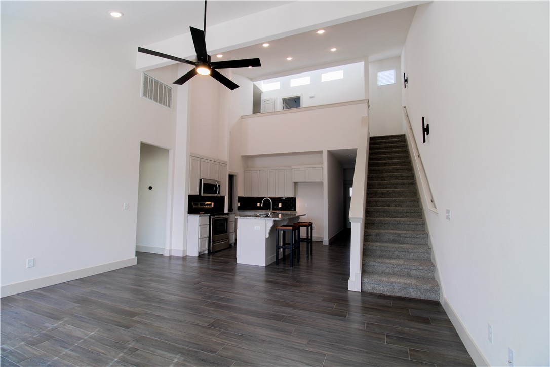 Incredible new townhome with cathedral ceilings and plentiful natural lighting from several windows along the roofline. This townhouse has a dedicated laundry room, with the primary bedroom on the first floor just off the main living space and two bedrooms on the second floor sharing a large bathroom. A large pantry space and plentiful cabinets are available in the kitchen. All New Stainless Steel Appliances and washer and dryer provided!
