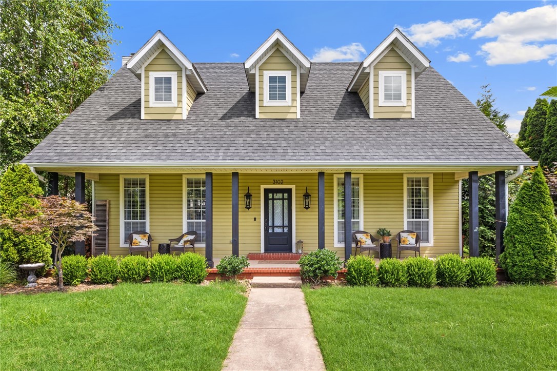 Discover the most inviting home in the neighborhood! This adorable green Craftsman, with its expansive front porch, exudes curb appeal and welcomes you home. Perfectly blending timeless charm with modern convenience, this gem is ideally situated just 10 minutes from vibrant Downtown Bentonville.
Enjoy the peace and quiet of a tucked-away neighborhood that offers exceptional privacy, while still being incredibly close to two highly-rated schools.
Beyond the main residence, you'll find a detached garage featuring a fantastic surprise: a separate, climate-controlled bonus room above! This versatile space, heated and cooled, is perfect for a home office, creative craft room, or a dedicated playroom.
This home isn't just a place to live; it's a lifestyle waiting to be embraced.
