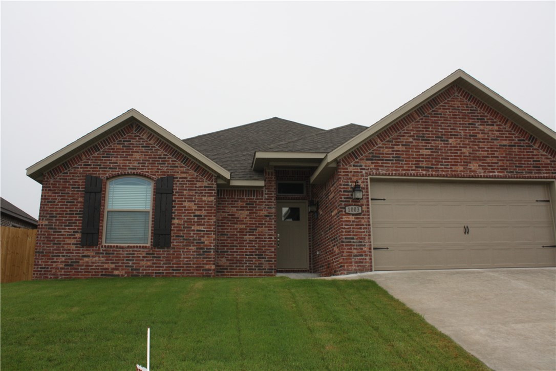 I AM BRAND NEW! Bentonville Schools. Split plan - 3 bedrooms 2 baths with hardwood floors, tile in all wet areas and carpet in bedrooms. White cabinetry, stainless appliance package, eat in kitchen and pantry. Master boasts large walk in closet and walk in shower along with jetted tub and double sink vanity. 2 inch blinds throughout. Covered patio & privacy fenced backyard! Don't miss this one!