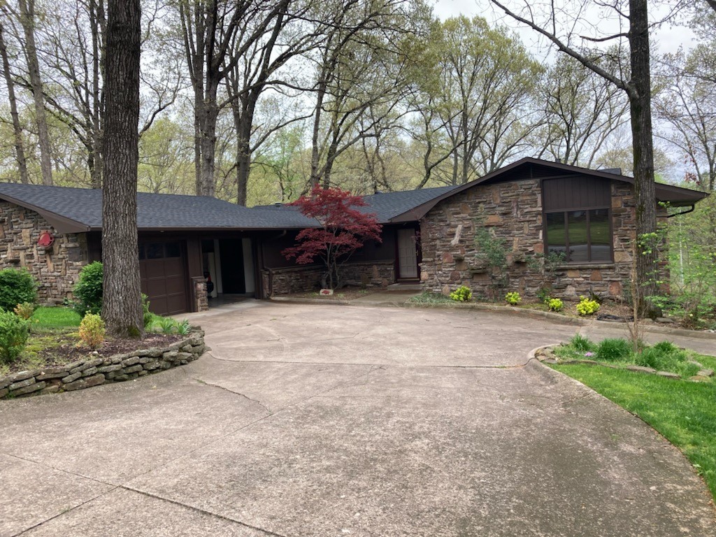 Well kept one owner home on quite cul-de-sac near all Bentonville amenities. Great 4 bedroom 2 level home that boosts heated inground pool, sunroom not included in square footage, lower level shop with roll up door and storage building. Home has new roof in 2022, furnace less than 2 years old, hot water heater less than 1 year old. Exterior painted in past couple of months. Excellent home for the busy family.