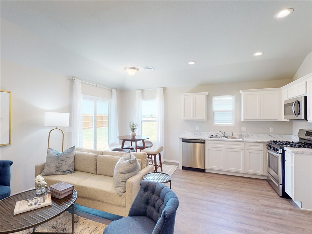 This home qualifies for up to $10,000 in closing cost assistance when using preferred lender and title company! The lovely Carlie plan is rich with curb appeal with its cozy covered porch and front yard landscaping. This home features 3 bedrooms, 2 bathrooms, an open-concept living/dining area, and a kitchen fully equipped with energy-efficient appliances and a pantry. The laundry room, conveniently located just off the garage, is perfect for any sized family. The master suite features a walk-in closet. Learn more about this home today! *Photos are of similar model