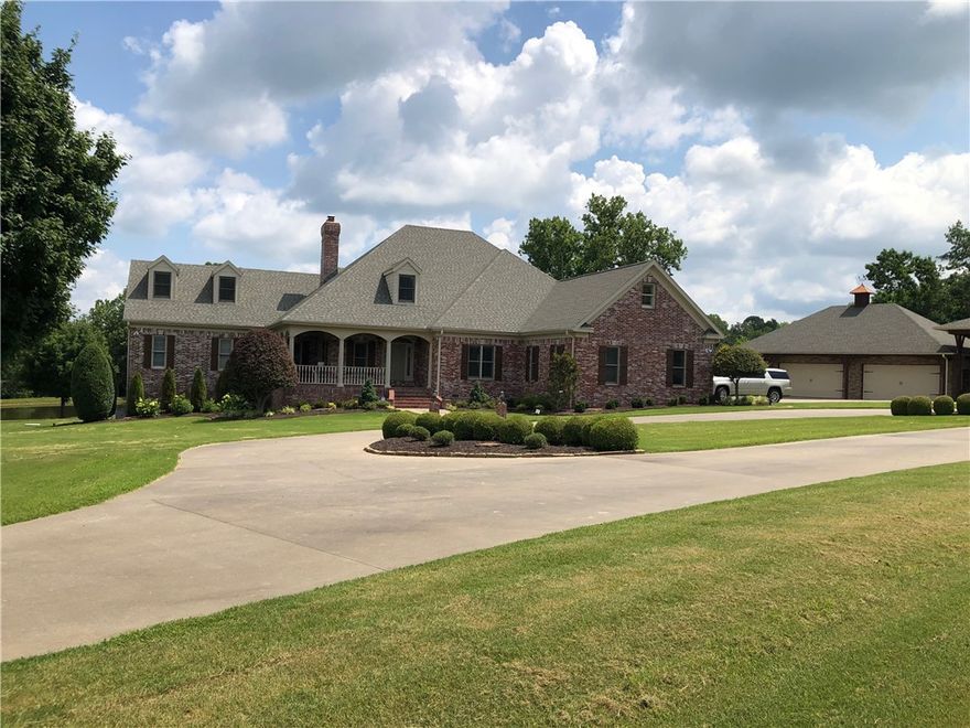 You must see this gorgeous family estate on 5+ acres at the end of cul de sac! Kitchen includes large island, granite countertops, stainless appliances, fireplace, 10' ceilings. Outdoor living space includes screened porch with view of the pond. Spacious living areas. Enjoy downstairs living area with fireplace, kitchenette, full bath and new carpet. It also includes a large room for workout and play room. Bonus! Extra large 4 car detached garage, upstairs bonus room, and RV covered storage. Move in Ready!!