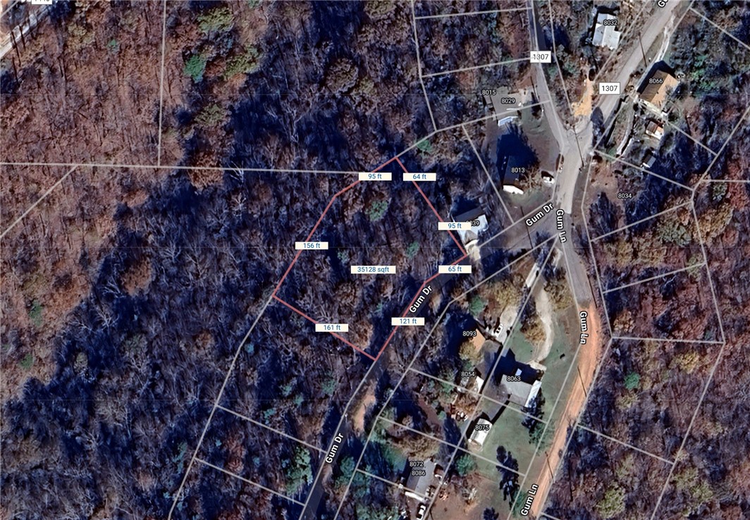 Beaver Lake area lot in the Beaver Shores Subdivision. Very Secluded with a few houses on the street. Prairie Creek Marina and 3 other boat launch ramps located just right around the corner. Minutes to Downtown Rogers. Water and electric at street.