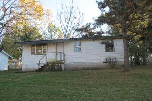 Great rental or investment property with this 3BR/1BA home on paved road with metal roof, fenced back yard and large living room. All #s are approx., age is estimate, sq. footage per assessor, buyer to verify existence of septic. www.hudhomestore.com HUD homes are sold As-Is.