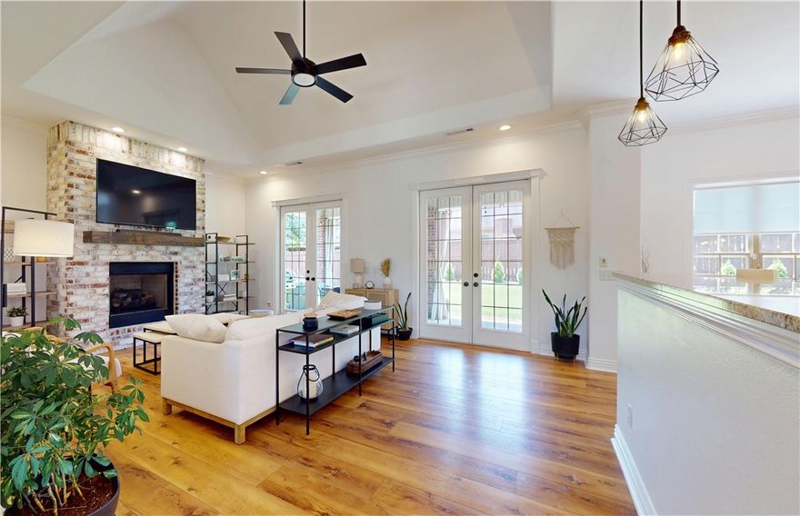 Open House Sunday January 11th 1:00 PM to 3:00 PM.  Elegant and extensively updated home in Bentonville’s sought-after Lochmoor Club. Back on market after buyer financing fell through—no fault of seller; inspections completed with no repairs requested. Features include interior paint (2022), new carpet, upgraded appliances, and designer lighting throughout. The light-filled living room boasts soaring ceilings, updated flooring, and a striking brick fireplace. Chef’s kitchen offers gas cooktop, vented stainless hood, and custom pull-out cabinetry. Smart-home lighting creates evening ambiance indoors and out. Additional upgrades: central vac, whole-home audio, intercom, and oversized garage. Bonus/media room pre-wired for projector. Private fenced yard with extended covered patio, café lighting, and room to entertain. Enjoy Lochmoor’s resort-style pool, pavilion, tennis, basketball, volleyball, and pickleball coming soon.